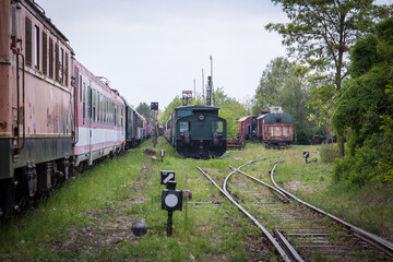 Obraz premium Wagons and locomotives on a scrap yard for railway systems