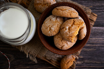 Delicious fresh cookies on old background