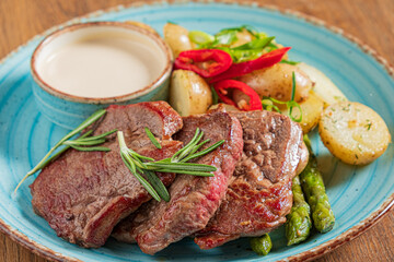 pork steak with potato and sauce