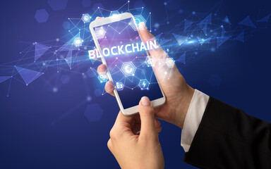 Hand using smartphone with technology concept