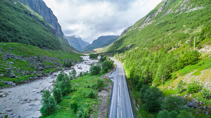 Fototapeta na wymiar Epic scenic road Hunnedalsvegen through an idyllic valley in Norway