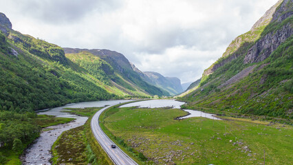 Fototapeta na wymiar Epic scenic road Hunnedalsvegen through an idyllic valley in Norway