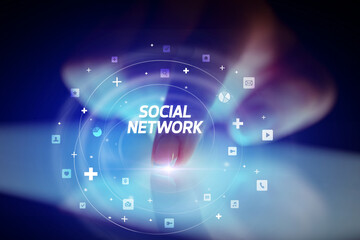 Finger touching tablet with social media icons concept