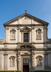 Fototapeta na wymiar Façade of Saint Stephen's Basilica, church estabilished in 5th century, in Milan city center, Lombardia region, Italy 