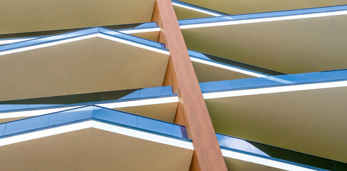 Geometric architecture detail modern balcony glass balustrade. Exterior design houses. Contemporary architecture modern building balcony background architecture concrete and glass modern facade panel