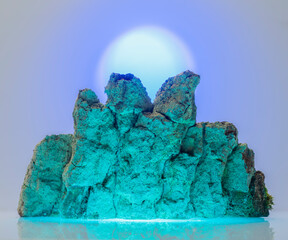turquoise-blue bark in moss in the form of mountains for the background of the podium for the product