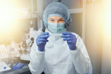 Scientist or nurse in a Medical Research Laboratory. Test tube