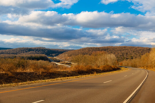 South Pennsylvania Highway Landscape During Winter with Golden Leaves and Blue Sky