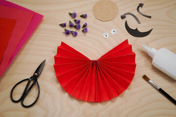 Step by step diy process handmade craft Ladybug made of paper and flowers. Step 4- glue the two...