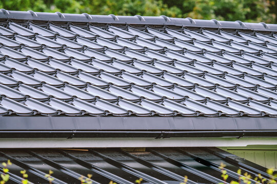 Wet Metal Grey Roof After Rain, Close Up Photo