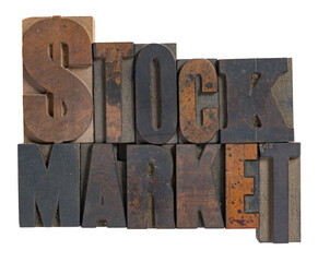 Isolated antique wood block type in reverse spelling stock market