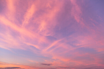 Sunrise, sunset pink violet blue sky with colorful clouds background texture