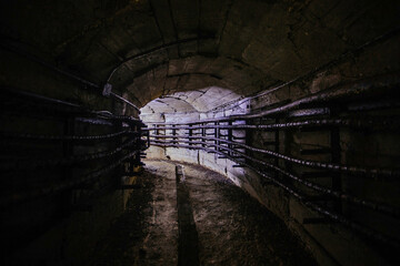 Electrical cables in the underground technical tunnel