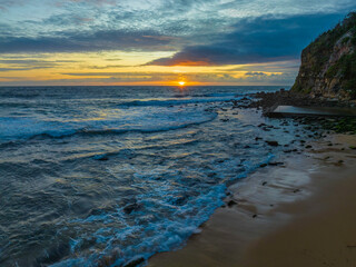 Sunrise seascape with clouds