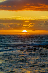 Fototapeta na wymiar Sunrise seascape with clouds