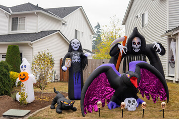 Halloween outdoor decorations with inflatable ghost, crow, skeleton, death, sculls