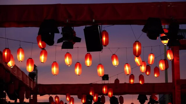 Lighted Japan lantern decoration at the stage in blue hour during Bon Odori