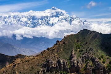 View of the Annapurna and Nilgiri mountains in the Kingdom of Mustang under a clear, blue sky