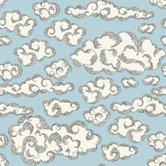 Vector seamless pattern with clouds. Sky pattern on a blue background. Hand drawing. - 540346026