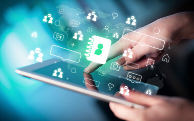 Close-up of a hand using tablet, social media concept