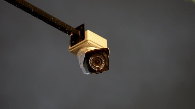 CCTV camera in rain drop during night