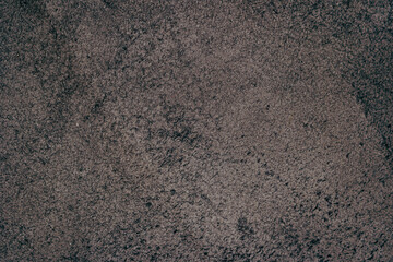Closeup detail of dark gray leather texture background.