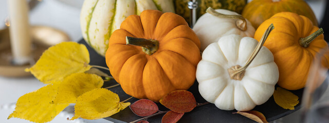 Idea for a beautiful autumn setting for thanksgiving family dinner or wedding. Orange pumpkin