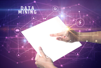 Holding futuristic tablet, security concept