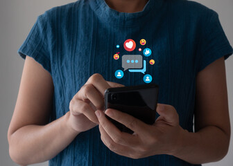 Social media and digital online concept, Women using smartphones with Social media at home. The concept of living on vacation and playing social media. technology, and online marketing.