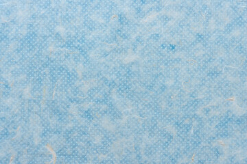 background with tissue paper and blue paper with dots