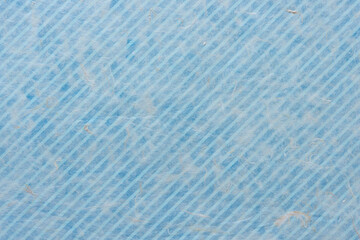 background with tissue paper and blue paper with stripes