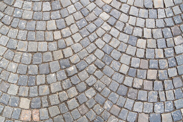 Brown square cobblestone sidewalk. Mock up or vintage grunge texture.