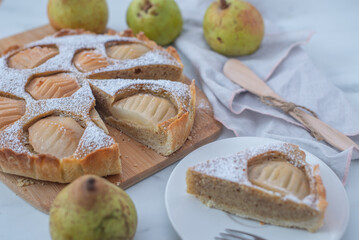 sweet home made pear almond pie on a table