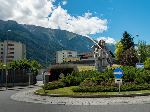 TELFS, AUSTRIA - 25. June 2022: Sculpture "Der Wilde" (the Savage) on a roundabout. Austrian culture in Tirol. The statue is a figure of the Telfer Schleicher running of the event Schleicherlaufen.