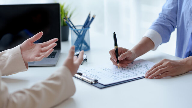 Graduates fill out the human Resources department application form and prepare personal document detailed study and interview notes and self-introduction. Job Application and Resume concept.