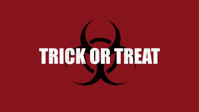 Trick Or Treat with toxic sign on red texture, motion holidays, horror and Halloween style background