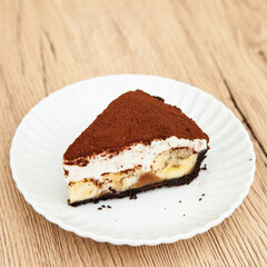 Banoffee pie, banana and caramel with biscuit and fresh cream