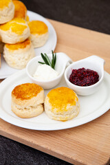 Homemade British Scones with clotted cream and raspberry jam 