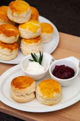 Homemade British Scones with clotted cream and raspberry jam 