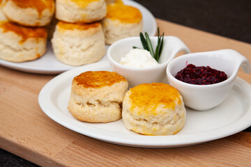 Homemade British Scones with clotted cream and raspberry jam 