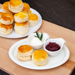 Homemade British Scones with clotted cream and raspberry jam 