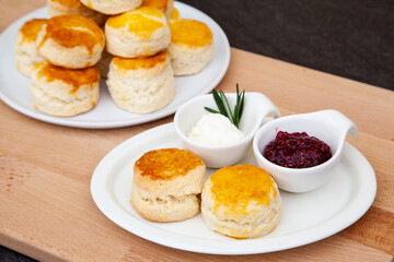 Homemade British Scones with clotted cream and raspberry jam 