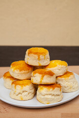 Homemade British Scones with clotted cream and raspberry jam 