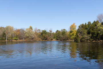 Beautiful Green Lane reservoir with Fall foliage surrounding it. I loved the view of this lake with all the trees on the edge. The colors of the leaves are changing to their Autumn browns.