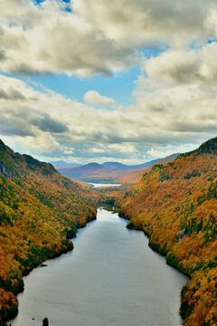 Fall landscape with river and mountains © Suchada
