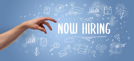 Close-Up of cropped hand pointing at business inscription