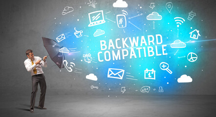 Businessman defending with umbrella, modern technology concept