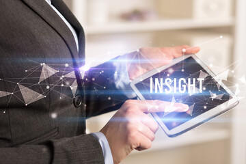 Close up hands using tablet