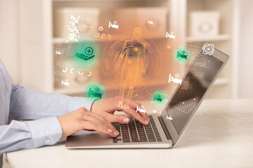 Doctor working on laptop with healthcare concept