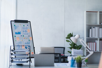 Asian businesswomen have the joy of talking on the phone with a laptop computer tablet 
